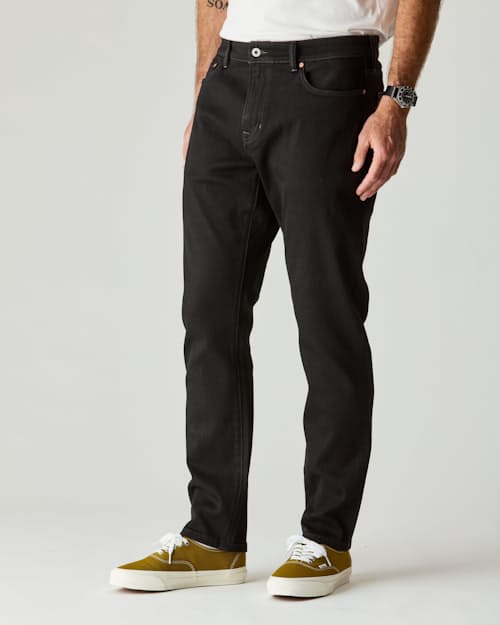 lifestyle image of Stretch Selvedge Denim - HB Athletic Tapered