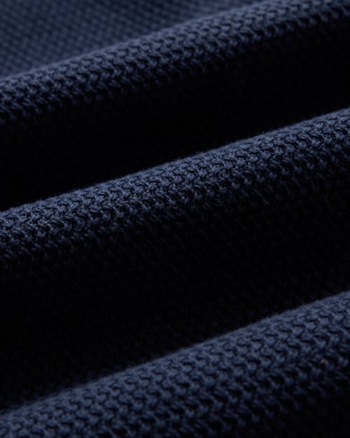 laydown detail image of The Button Down Polo