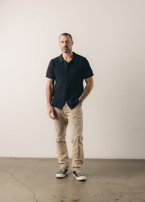 on model image of The Button Down Polo