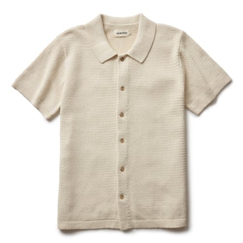 laydown image of The Button Down Polo