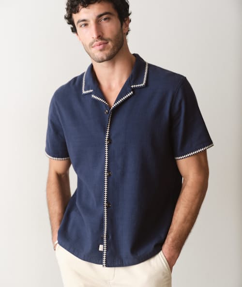 on model image of Embroidered Resort Short Sleeve Shirt