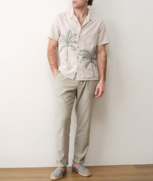 on model image of Embroidered Resort Short Sleeve Shirt
