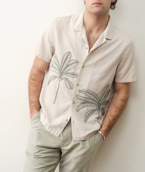 on model image of Embroidered Resort Short Sleeve Shirt