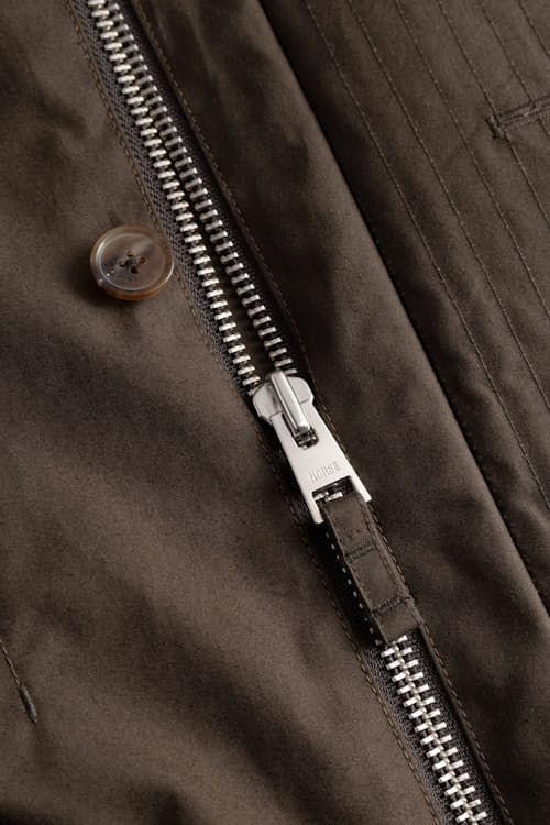laydown detail image of Holmen Wax Raglan Light Jacket