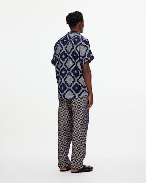 on model image of Camp Collar Crochet Shirt