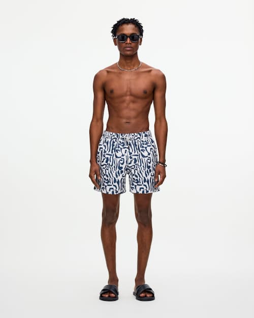 on model image of The Resort Swim Short - 5"