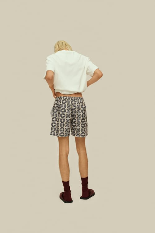 on model image of The Resort Swim Short - 5"