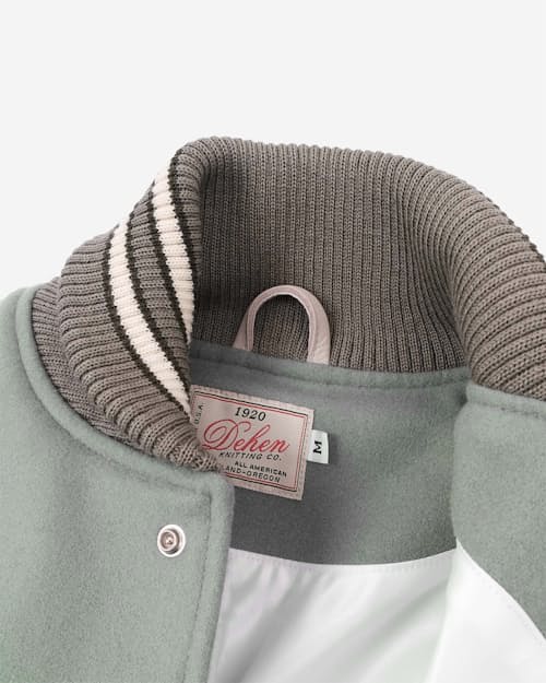 laydown detail image of Leather and Wool-Blend Varsity Bomber Jacket