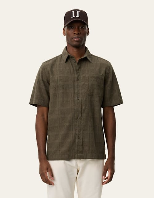 on model image of Charlie Short Sleeve Shirt