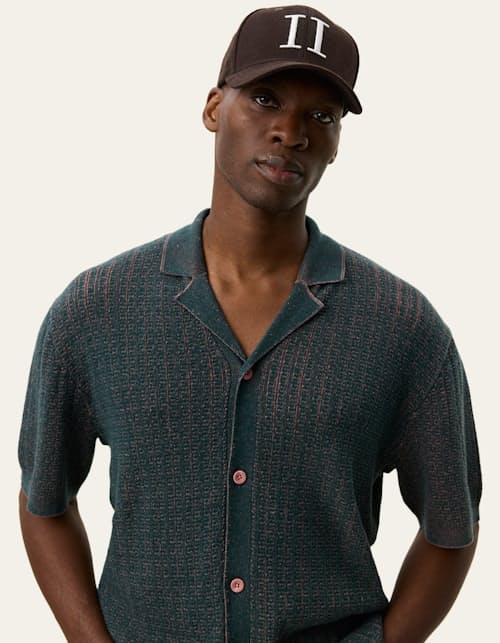 on model image of Evan Button Down Sweater Polo