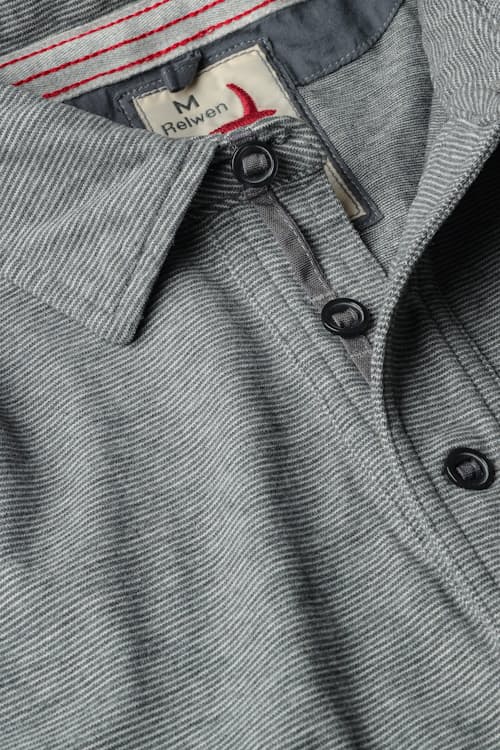 laydown detail image of Fineline Jersey Polo