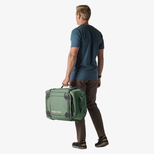 on model image of Gear Warrior XE 2 Wheeled Convertible Carry-On
