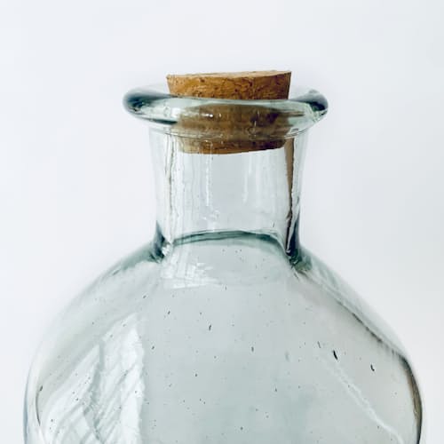 laydown detail image of Clear Bottle with Green Agave
