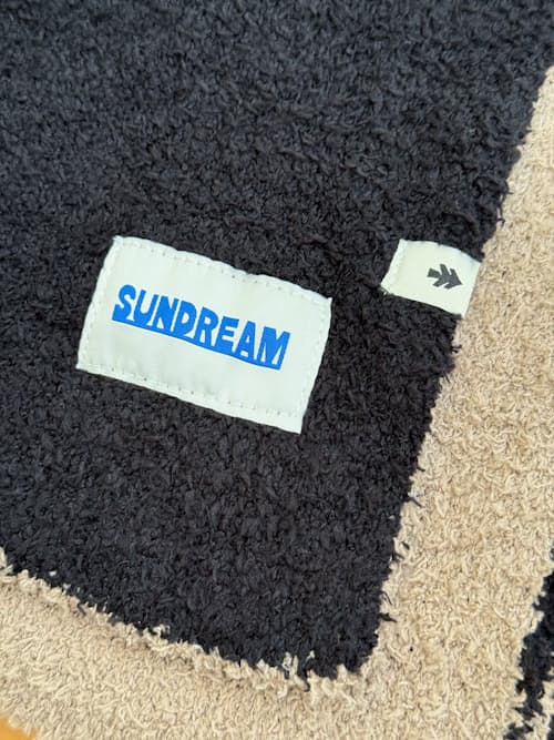 laydown detail image of Huckberry x Sundream Plush Cowboy Throw