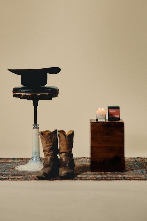 lifestyle image of Cowboy Christmas Candle  8 oz