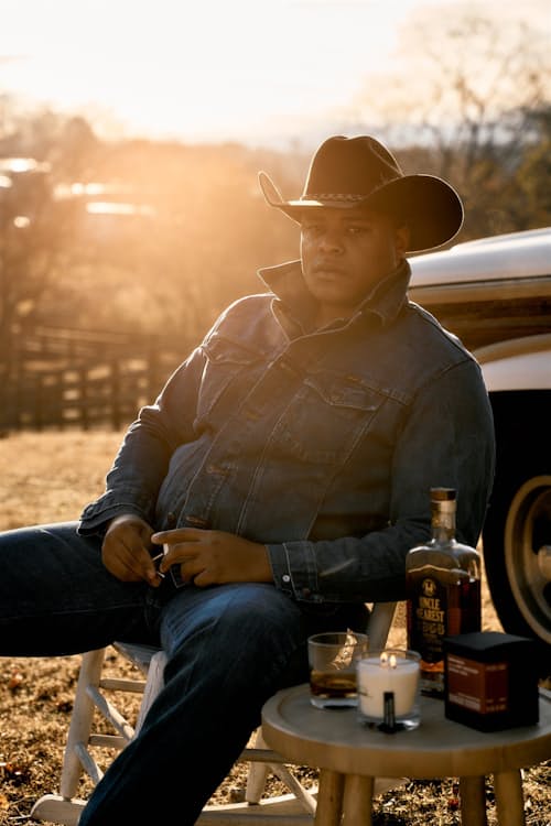 lifestyle image of Cowboy Christmas Candle  8 oz