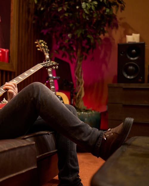 lifestyle image of Noel Gallagher Lone Star Chukka