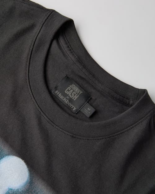 laydown detail image of Man in Black T-Shirt