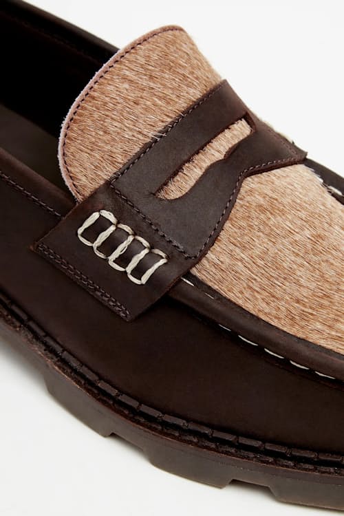 laydown detail image of Modena Penny Loafer