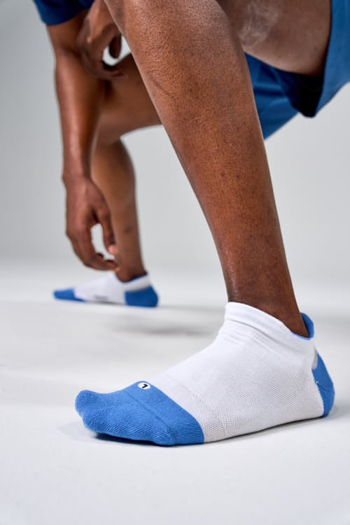 on model image of Elite Max Cushion Tab Socks