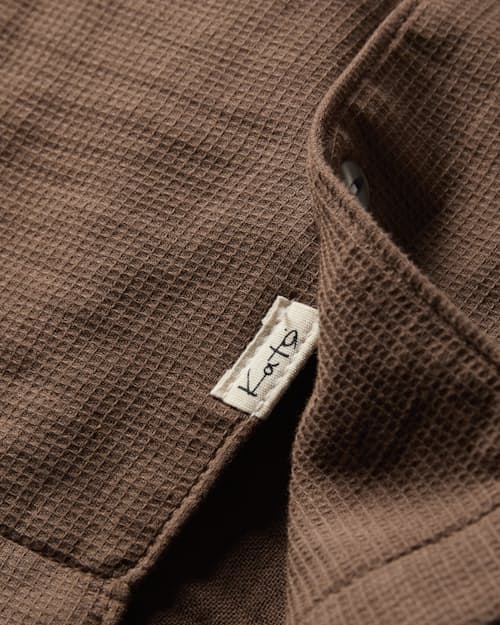 laydown detail image of The Wrench Waffle Camp Shirt