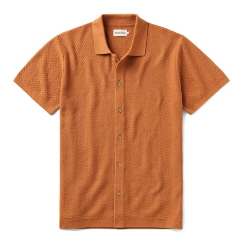 laydown image of The Button Down Polo