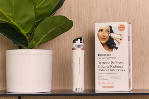 lifestyle image of TheraFace De-puffing Wand