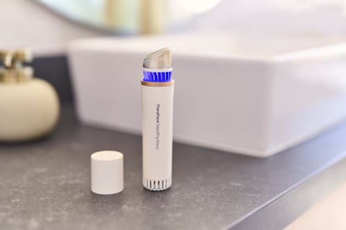 lifestyle image of TheraFace De-puffing Wand