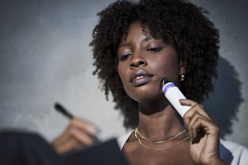 lifestyle image of TheraFace De-puffing Wand