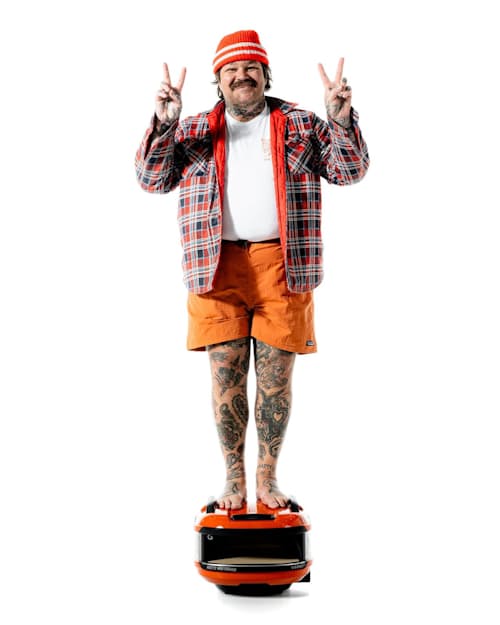 on model image of Matty Matheson x Gozney Tread Portable Pizza Oven