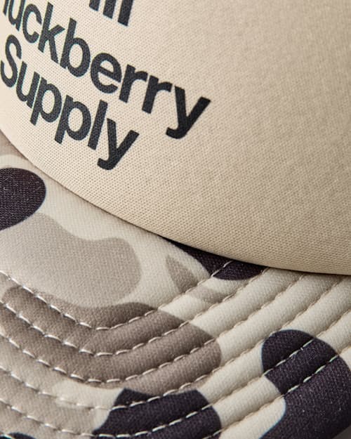 laydown detail image of Animated Camo Huckberry Supply Trucker