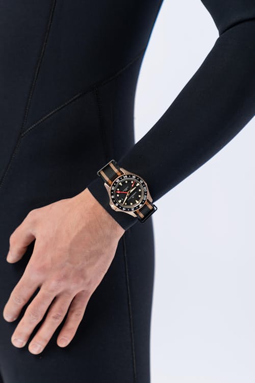 on model image of Khaki Navy Scuba Automatic GMT 43mm Watch