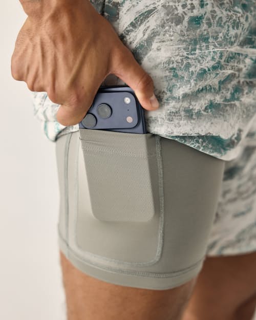 on model image of Performance Lined Swim Trunk - 7"