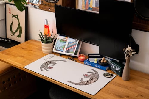 lifestyle image of Tigers by Taguchi Tomoki Mousepad