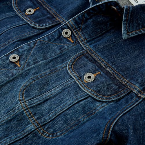 laydown image of Denim Trucker Jacket