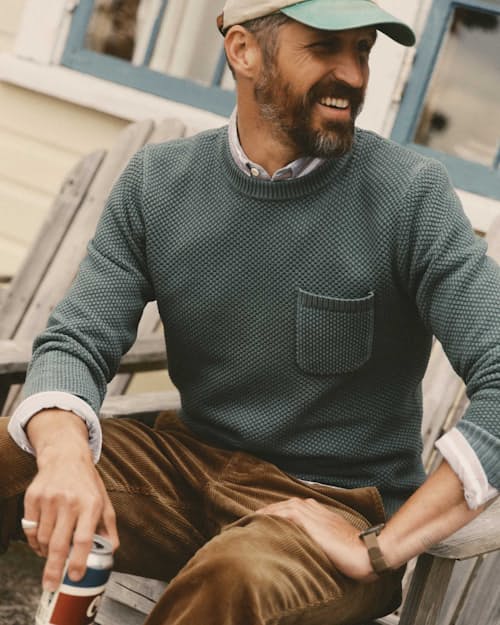 lifestyle image of The Crawford Crew Sweater