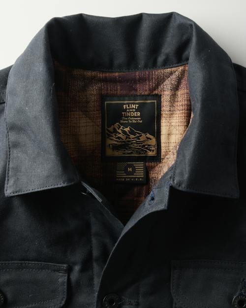 laydown detail image of Flannel-Lined Quilted Waxed Rancher Jacket
