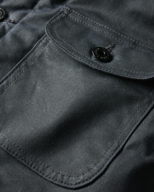 laydown detail image of Flannel-Lined Quilted Waxed Rancher Jacket