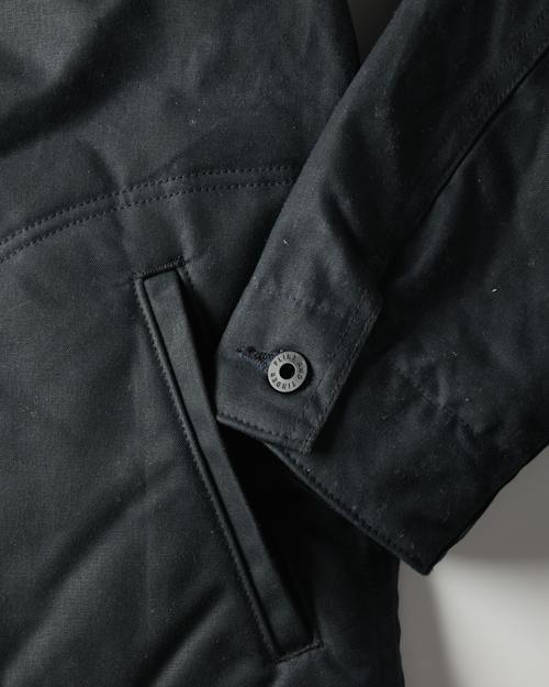 laydown detail image of Flannel-Lined Quilted Waxed Rancher Jacket