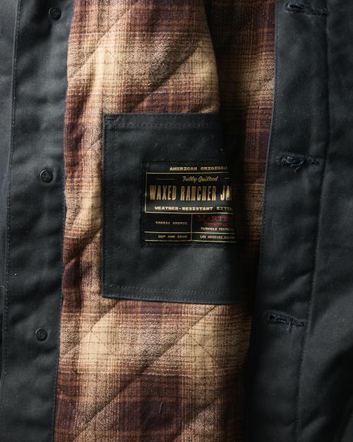 laydown detail image of Flannel-Lined Quilted Waxed Rancher Jacket