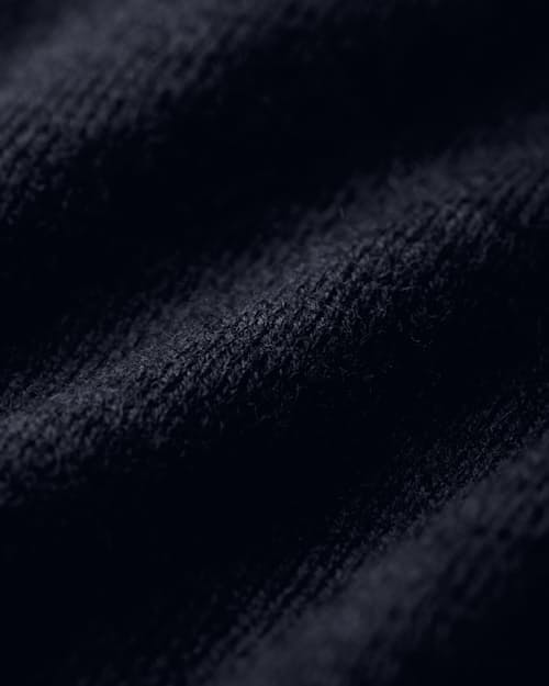 laydown detail image of Cotton Merino V-Neck Sweater