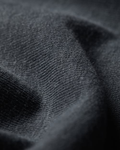 laydown detail image of PatinaTech Hoodie