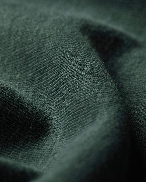 laydown detail image of PatinaTech Hoodie