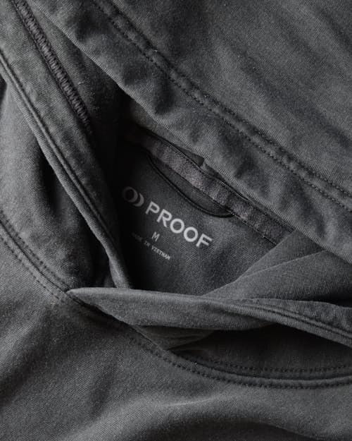 laydown detail image of PatinaTech Hoodie
