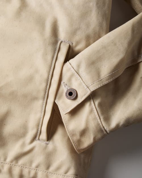 laydown detail image of Flannel-Lined Waxed Trucker Jacket
