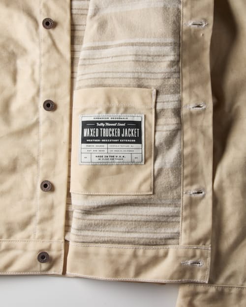 laydown detail image of Flannel-Lined Waxed Trucker Jacket