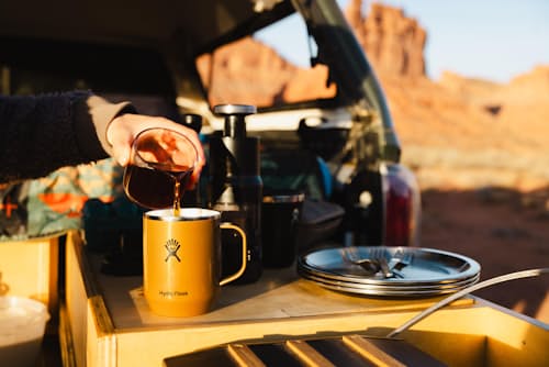 lifestyle image of Hydro Flask Campcore 12 oz Lightweight Mug Latte Brown