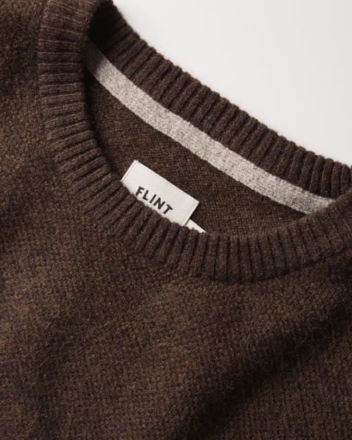 laydown detail image of Fine Merino Crewneck Sweater