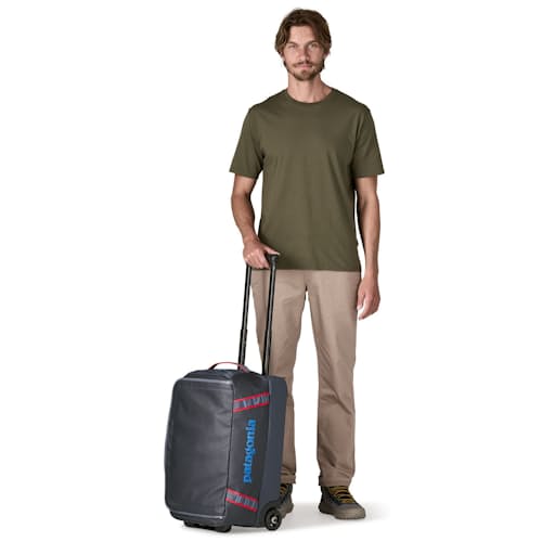 on model image of Black Hole Wheeled Duffel 40L