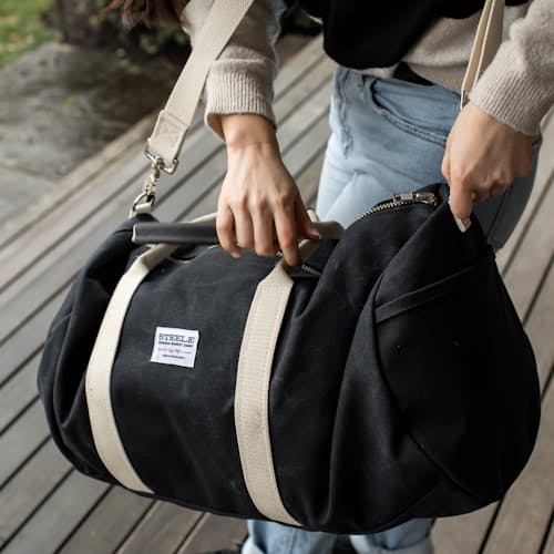 lifestyle image of Waxed Canvas Duffle Bag